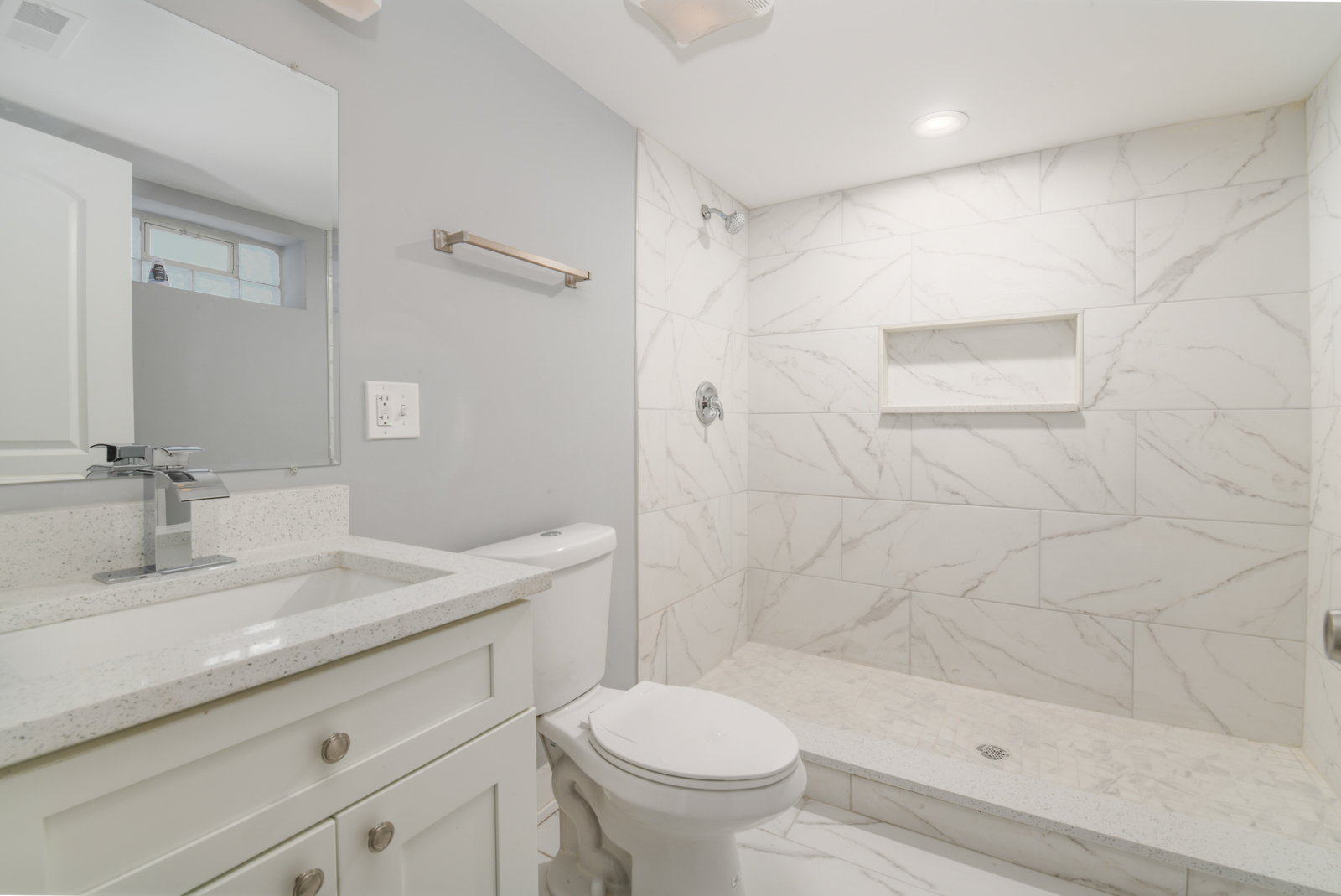 16542 Paulina Street Markham, IL 60428 - Photo 24 of 29 a bathroom with a sink a toilet and shower