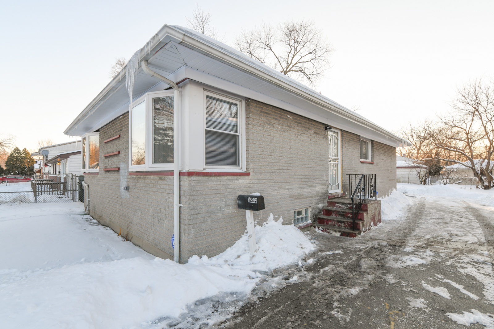 16542 Paulina Street Markham, IL 60428 - Photo 25 of 29 a view of a white house