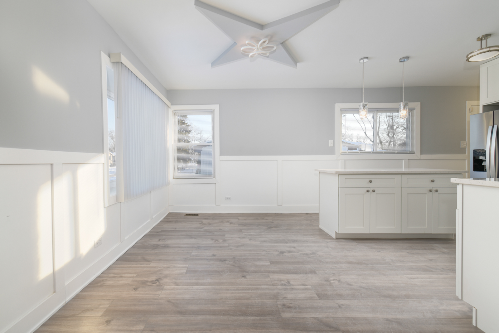 16542 Paulina Street Markham, IL 60428 - Photo 8 of 29 a view of a kitchen with a sink cabinets and wooden floor