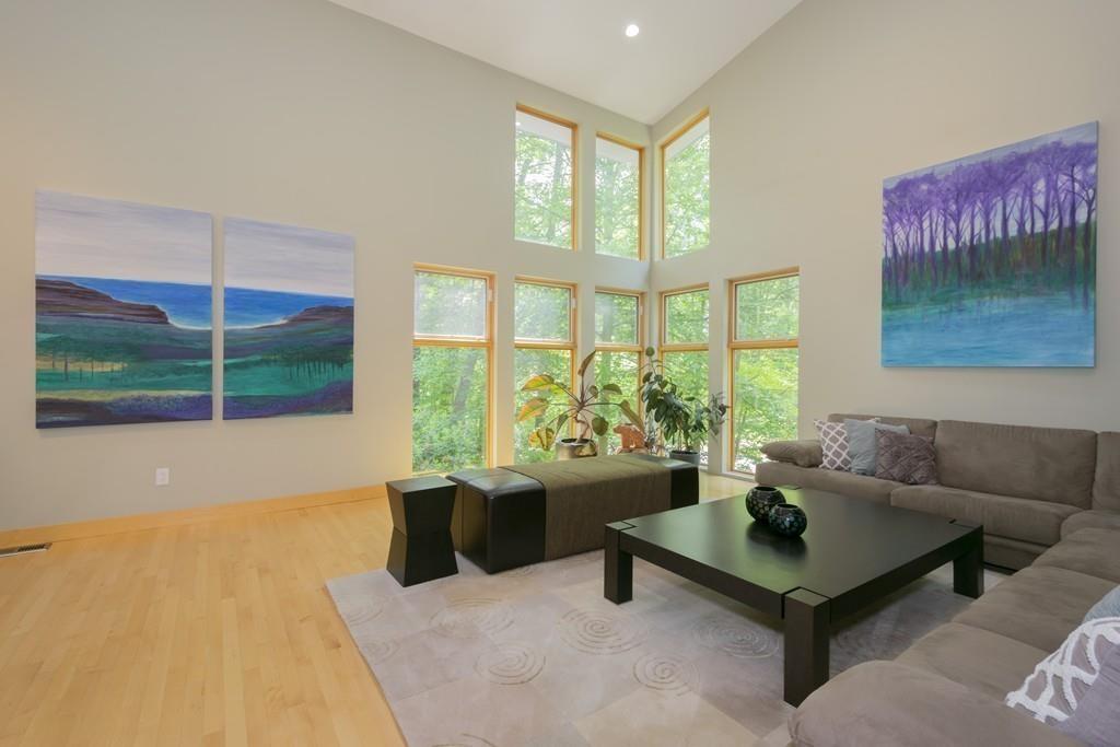 15 Turning Mill Road Lexington, MA 02420 - Photo 11 of 42 a living room with furniture and a large window