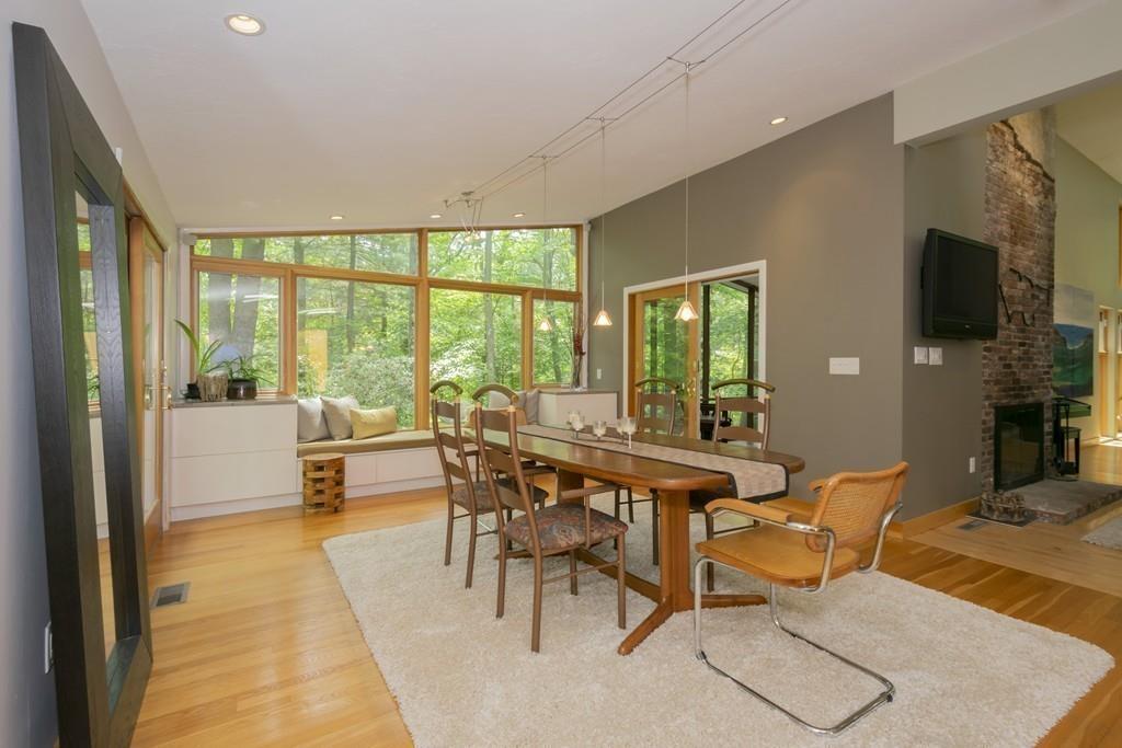 15 Turning Mill Road Lexington, MA 02420 - Photo 18 of 42 a view of a dining room with furniture window and outside view