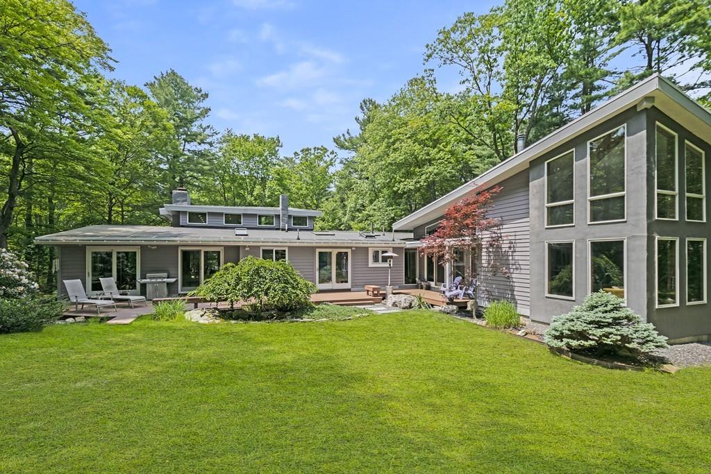 15 Turning Mill Road Lexington, MA 02420 - Photo 3 of 42 a front view of house with yard and green space