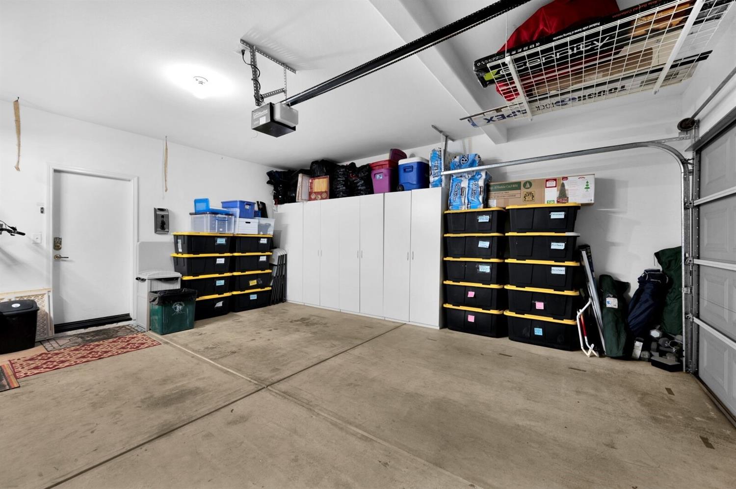 1968 North Tuscany Lane Clovis, CA 93619 - Photo 23 of 40 a view of walk in closet with clothes and shoes