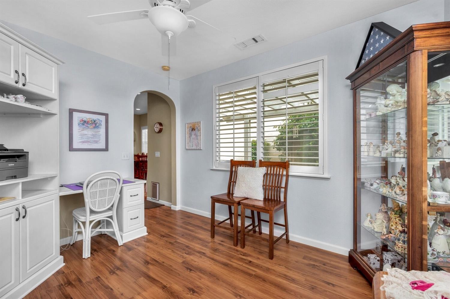 1968 North Tuscany Lane Clovis, CA 93619 - Photo 26 of 40 a workspace with wooden floor