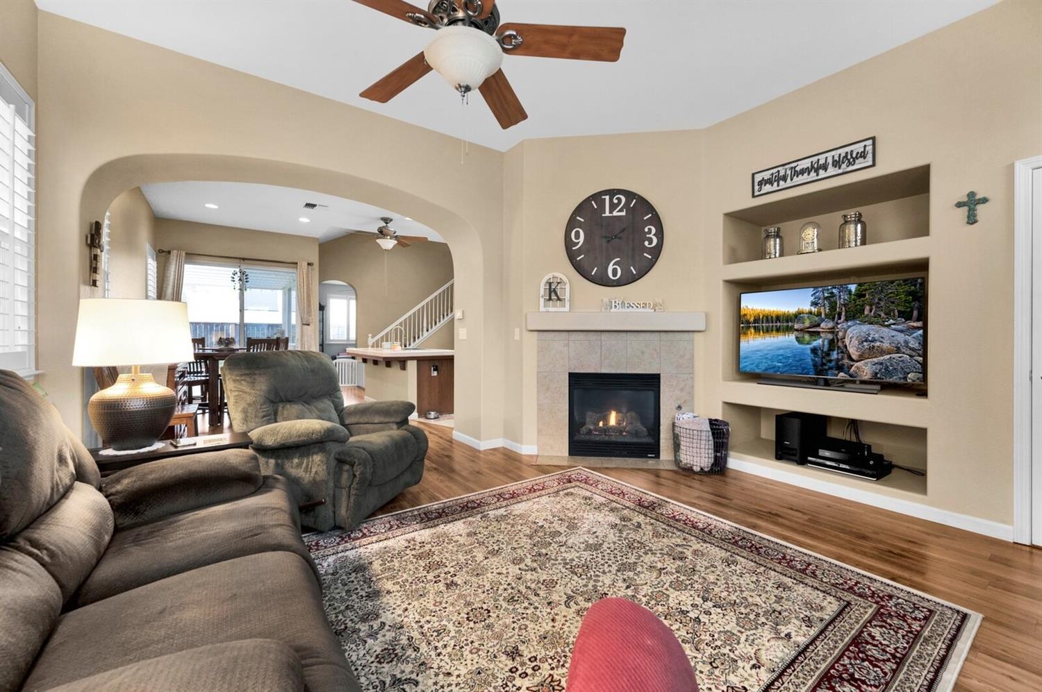 1968 North Tuscany Lane Clovis, CA 93619 - Photo 3 of 40 a living room with furniture and a fireplace