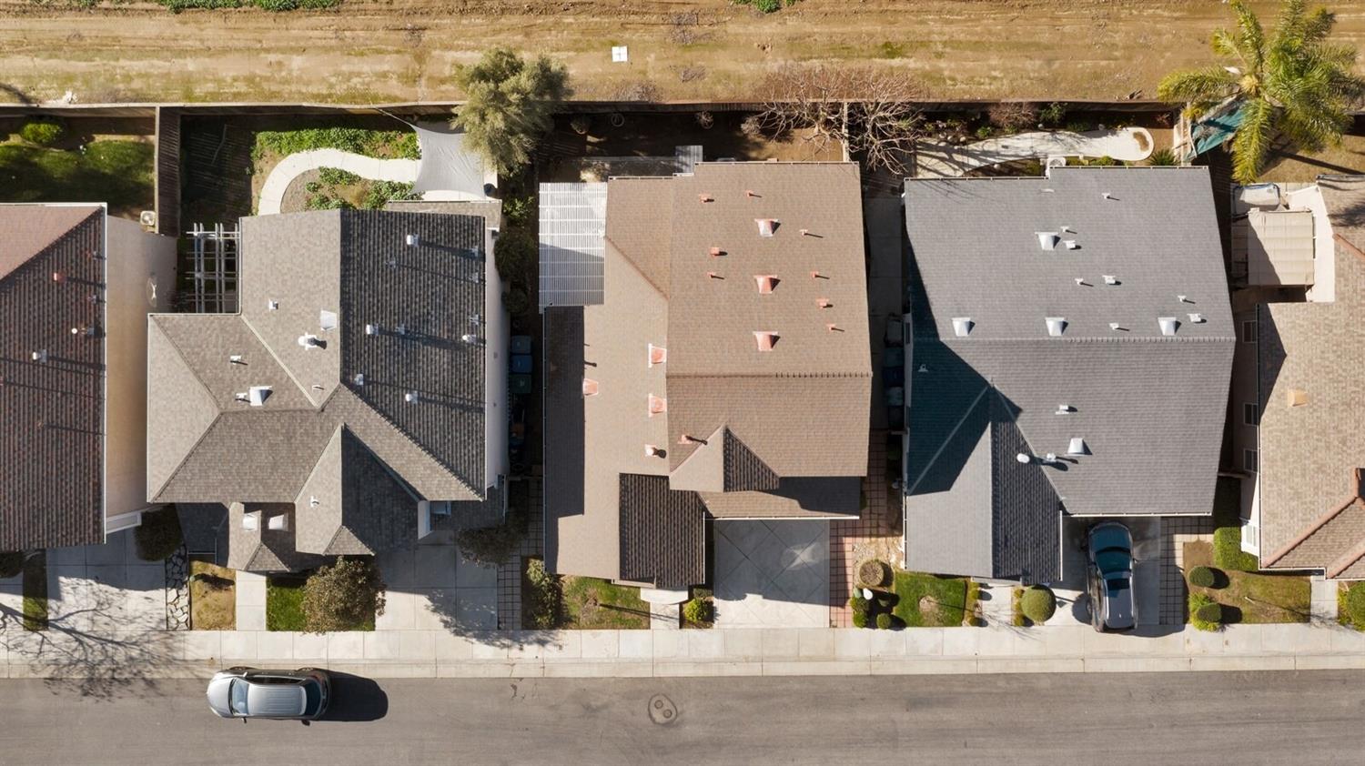 1968 North Tuscany Lane Clovis, CA 93619 - Photo 37 of 40 an aerial view of multiple houses with yard