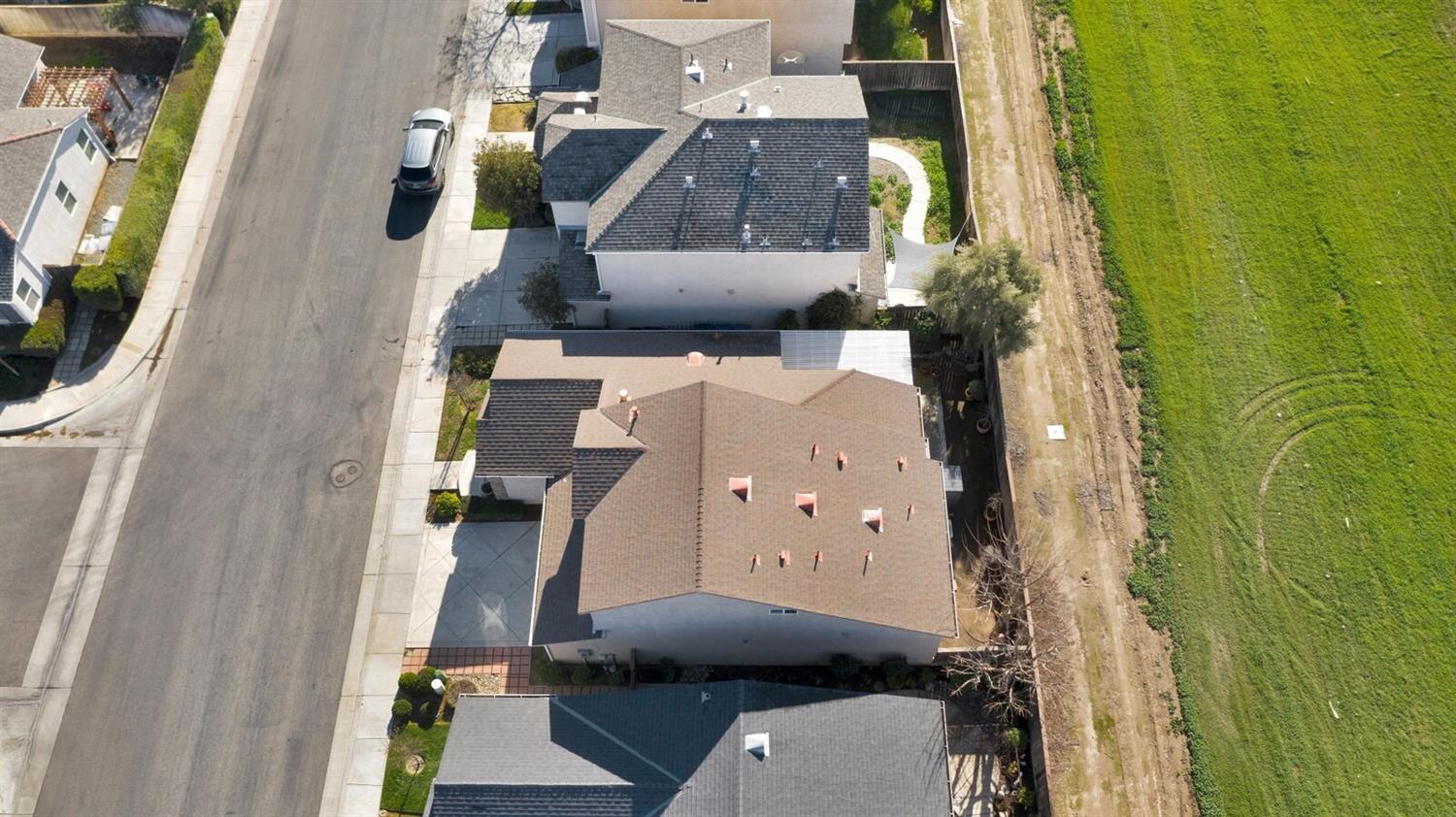 1968 North Tuscany Lane Clovis, CA 93619 - Photo 39 of 40 an aerial view of residential houses with outdoor space