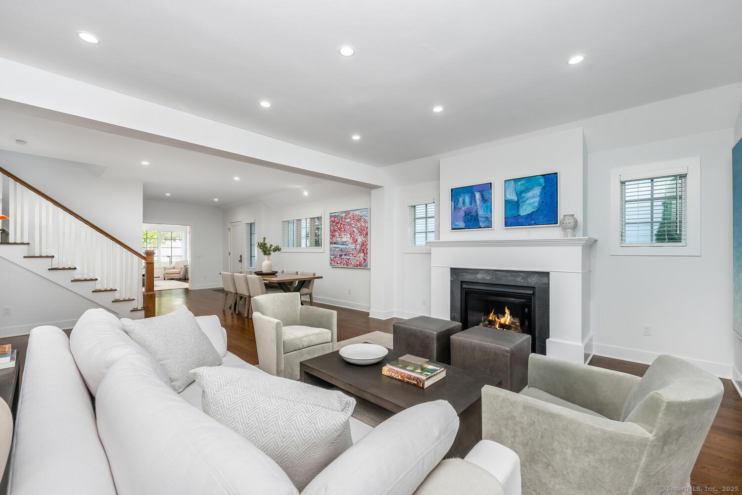 72 Kensett Lane Darien, CT 06820 - Photo 13 of 39 a living room with furniture and a fireplace