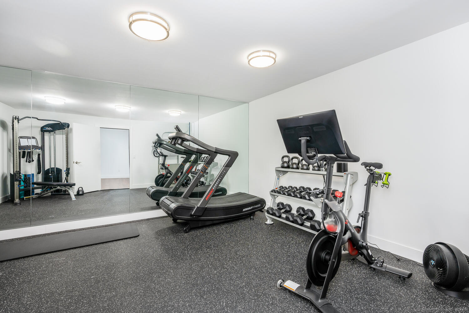 72 Kensett Lane Darien, CT 06820 - Photo 32 of 39 a view of a room with gym equipment