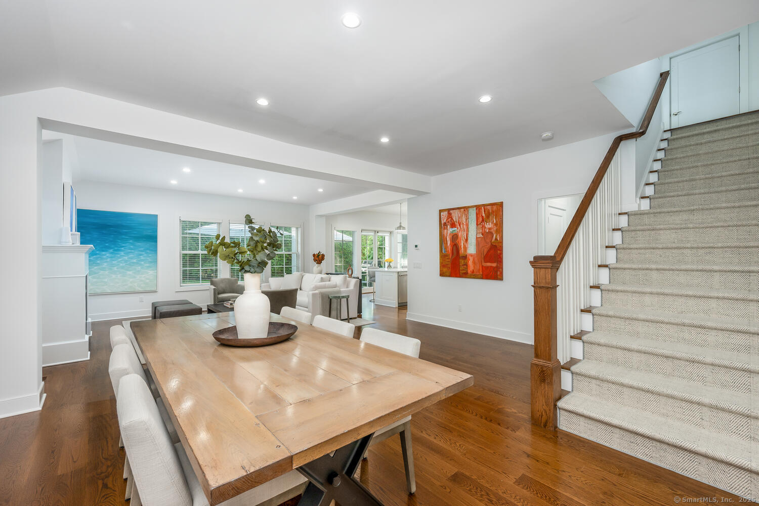 72 Kensett Lane Darien, CT 06820 - Photo 5 of 39 a view of a dining room with furniture and wooden floor