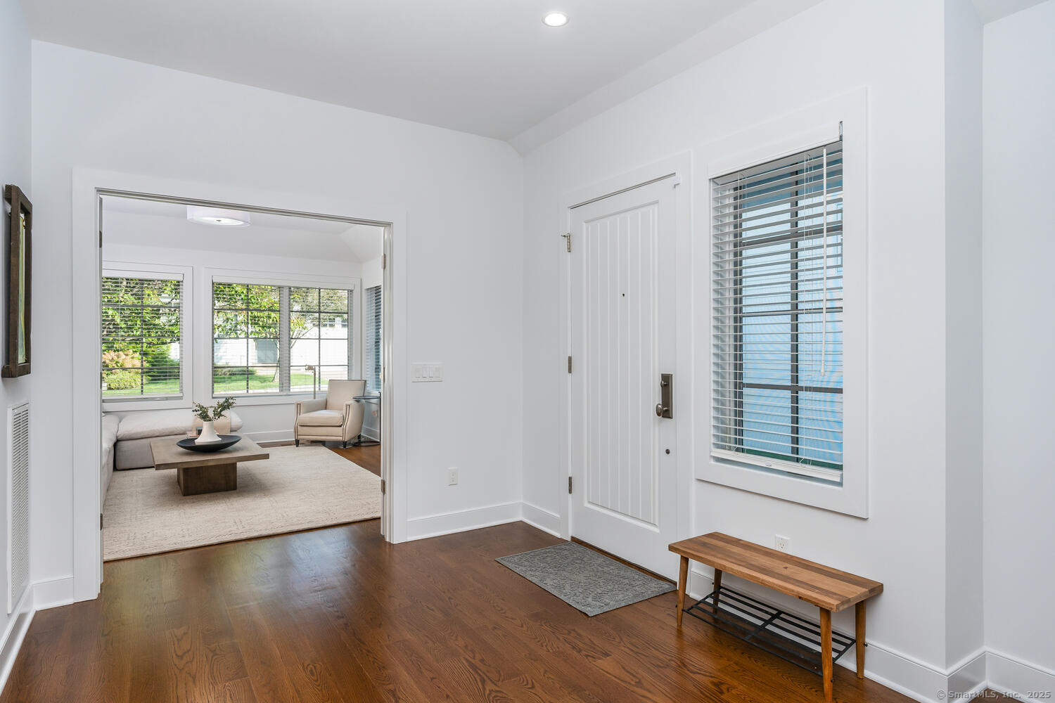 72 Kensett Lane Darien, CT 06820 - Photo 6 of 39 a view of a livingroom with furniture and a window