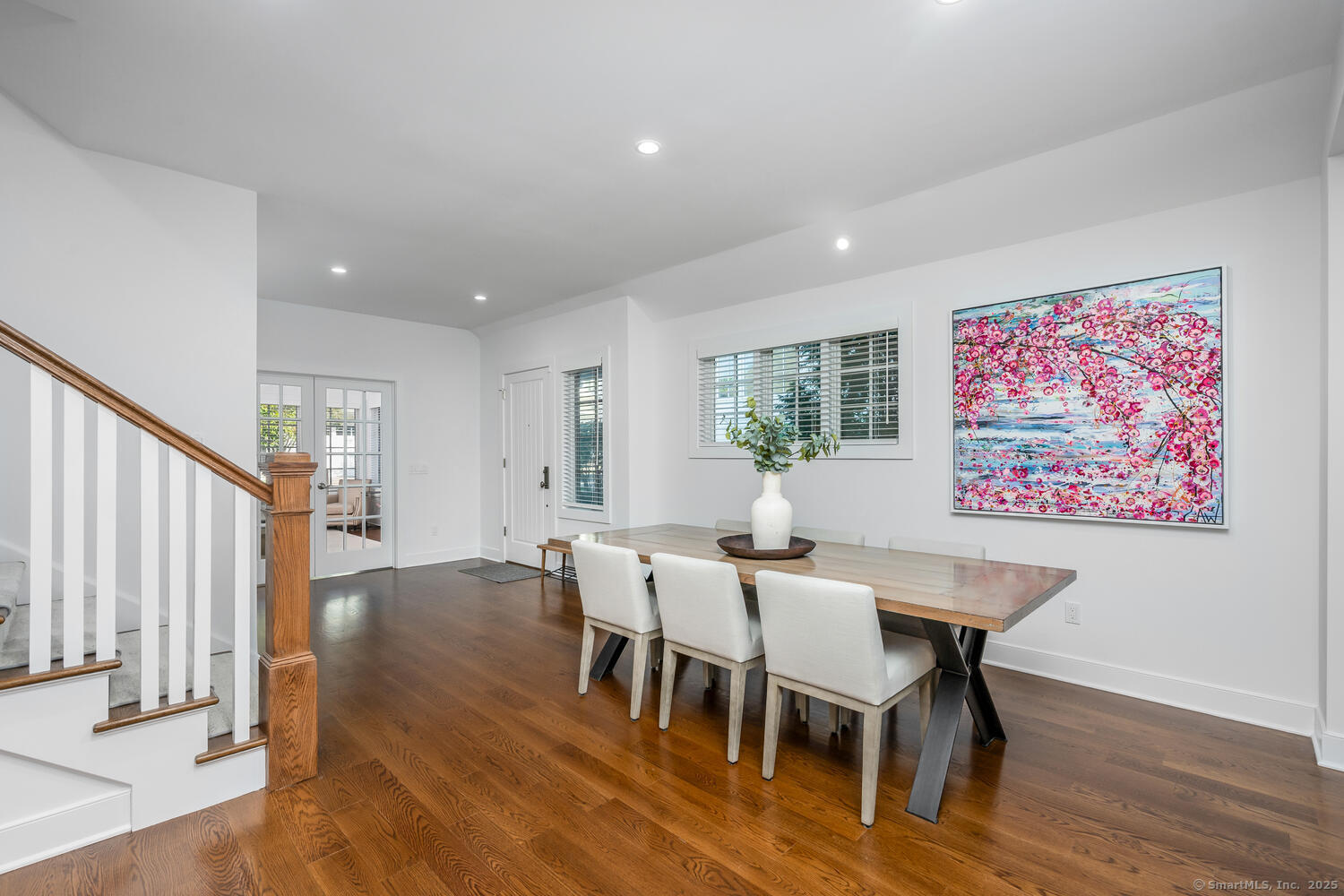 72 Kensett Lane Darien, CT 06820 - Photo 8 of 39 a view of a a dining room with furniture window and wooden floor