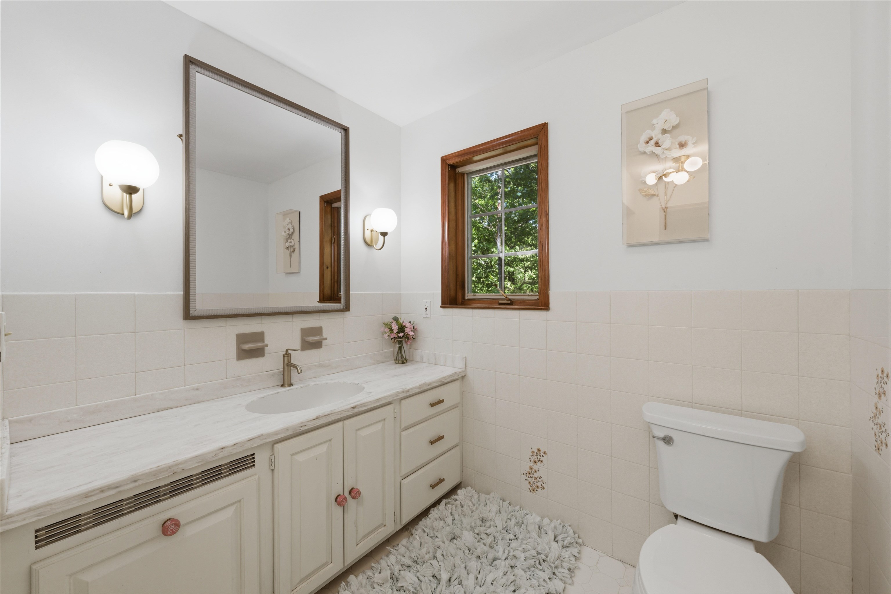 2 Carol Road Butler, NJ 07405 - Photo 29 of 49 a bathroom with a toilet a sink and mirror