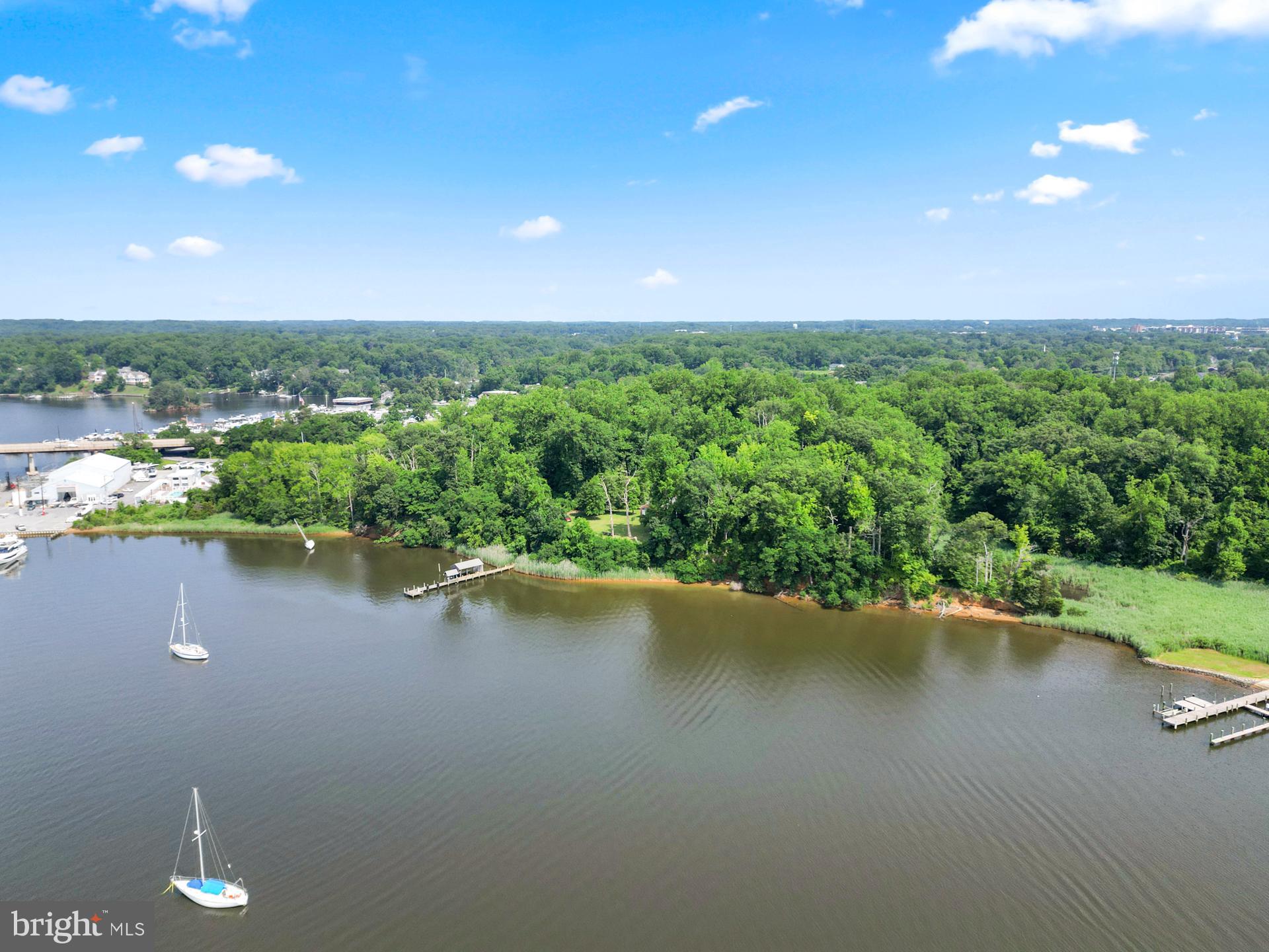 27 Old South River Road Edgewater, MD 21037 - Photo 11 of 29 a view of a lake with a city