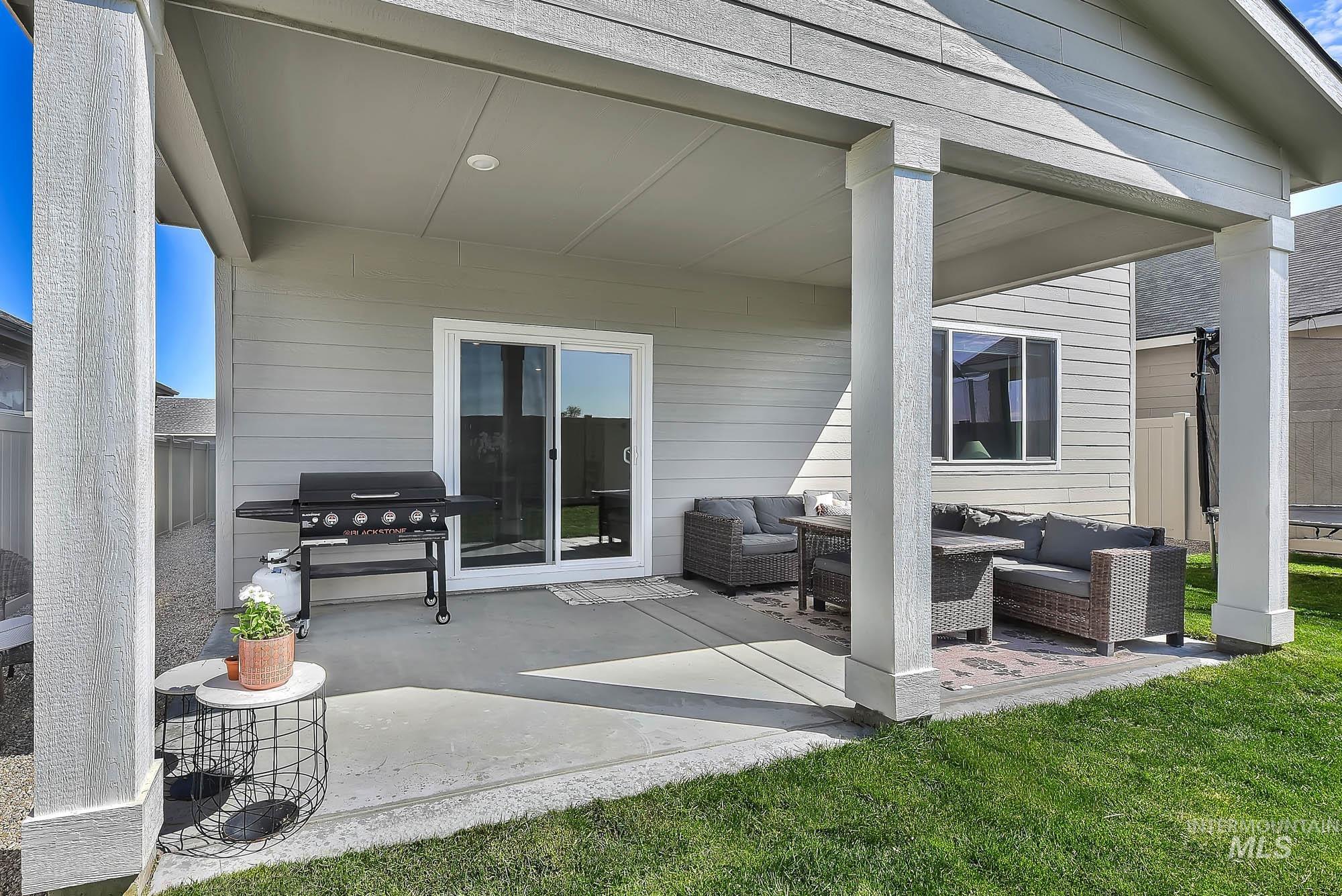 717 West Lyra Street Meridian, ID 83642 - Photo 45 of 50 Covered patio with a concrete slab, recessed lighting, and white siding