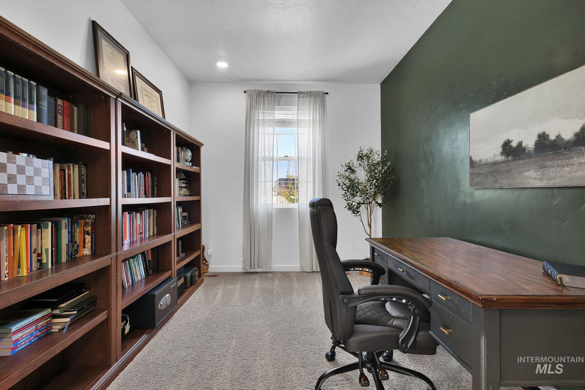 717 West Lyra Street Meridian, ID 83642 - Photo 5 of 50 Integrated dark wood-finish shelving with varied compartment sizes