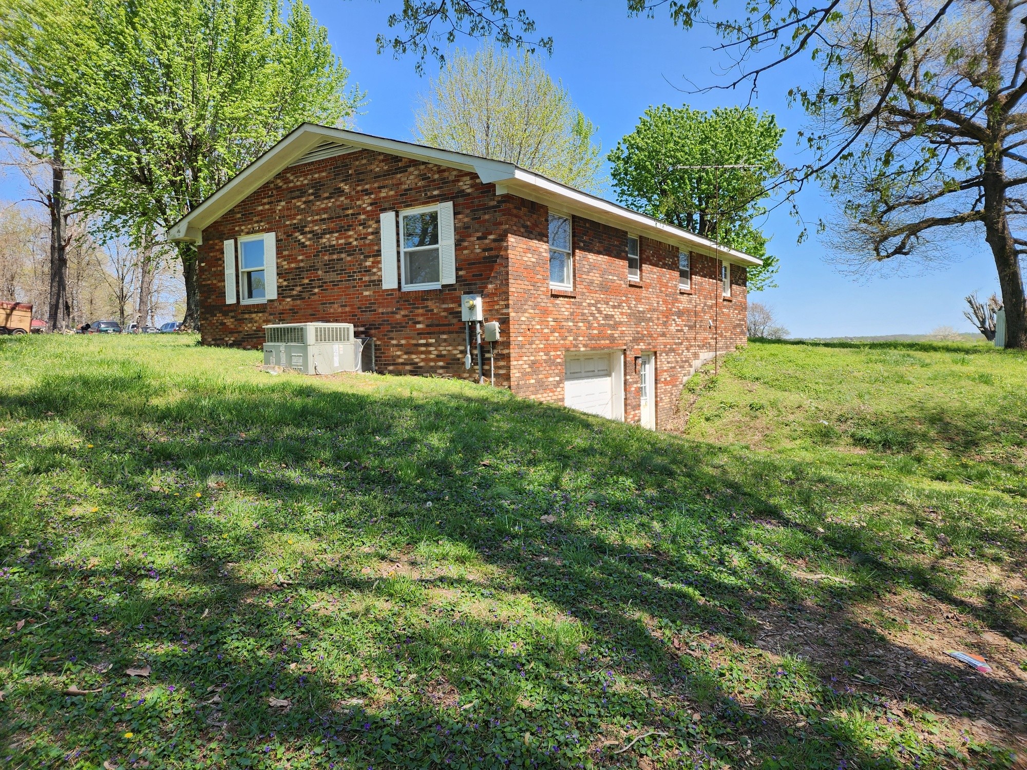288 Dotson Road Lafayette, TN 37083 - Photo 8 of 25 a view of a house with a yard