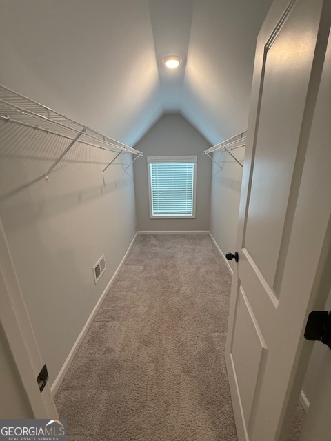 123 Weeping Moss Way Kathleen, GA 31047 - Photo 23 of 34 a view of an empty room with a mirror