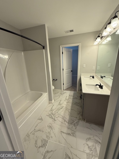 123 Weeping Moss Way Kathleen, GA 31047 - Photo 24 of 34 a bathroom with a sink mirror and a shower