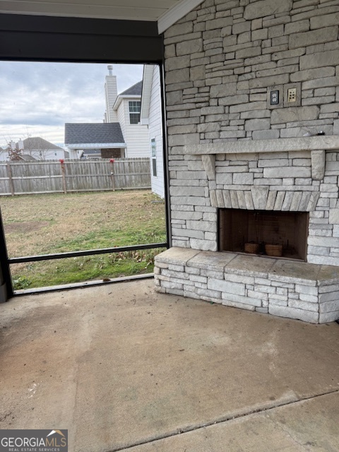 123 Weeping Moss Way Kathleen, GA 31047 - Photo 33 of 34 a view of fireplace and kitchen