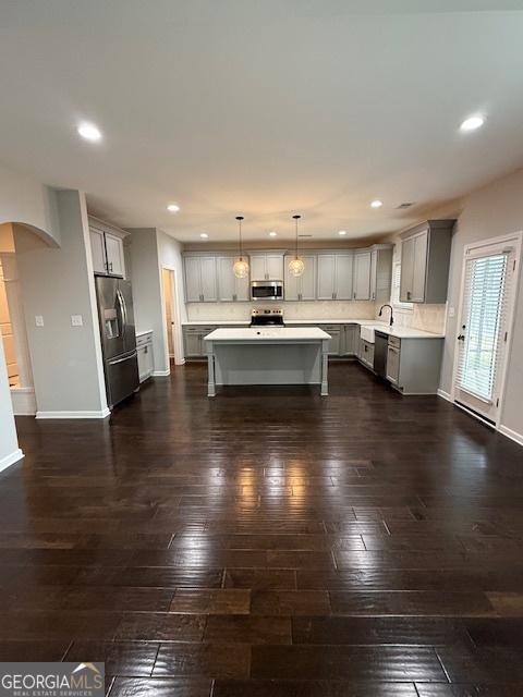 123 Weeping Moss Way Kathleen, GA 31047 - Photo 4 of 34 a view of kitchen with cabinets and wooden floor