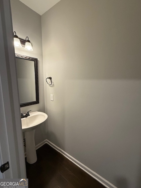 123 Weeping Moss Way Kathleen, GA 31047 - Photo 6 of 34 a bathroom with a sink a toilet and mirror
