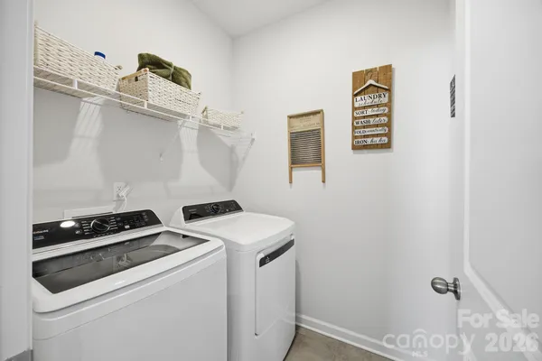 a view of a workspace with furniture