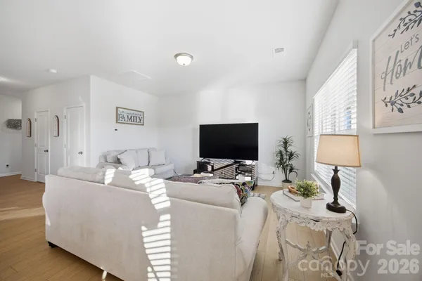 a view of a hallway with the wooden floor