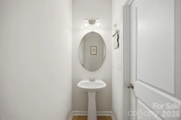 an aerial view of a house with a swimming pool