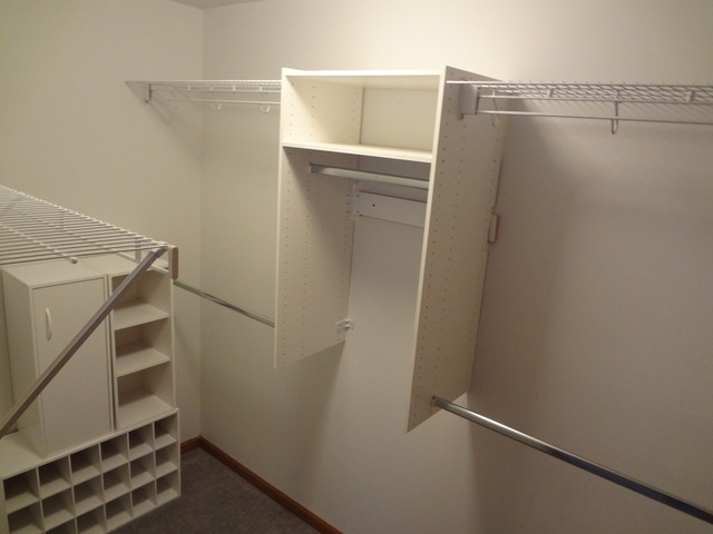 13336 Round Barn Road Plainfield, IL 60585 - Photo 13 of 25 a view of walk in closet with empty racks