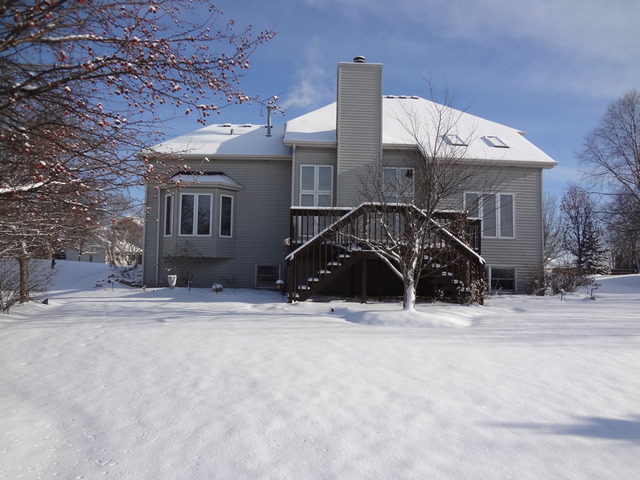13336 Round Barn Road Plainfield, IL 60585 - Photo 24 of 25 a front view of a house with a yard