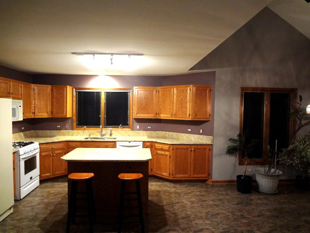 13336 Round Barn Road Plainfield, IL 60585 - Photo 6 of 25 a kitchen with a sink and a stove top oven