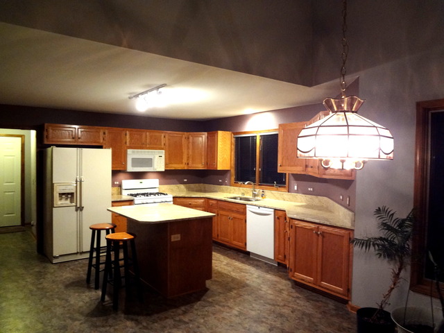 13336 Round Barn Road Plainfield, IL 60585 - Photo 8 of 25 a kitchen with a sink a counter top space and appliances