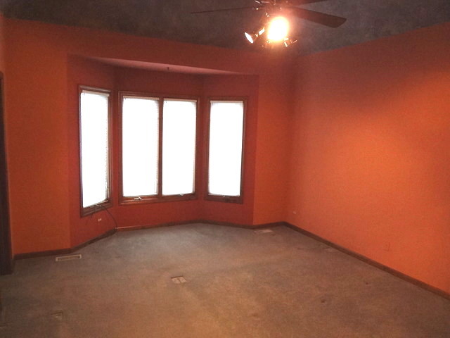 13336 Round Barn Road Plainfield, IL 60585 - Photo 10 of 25 an empty room with a window