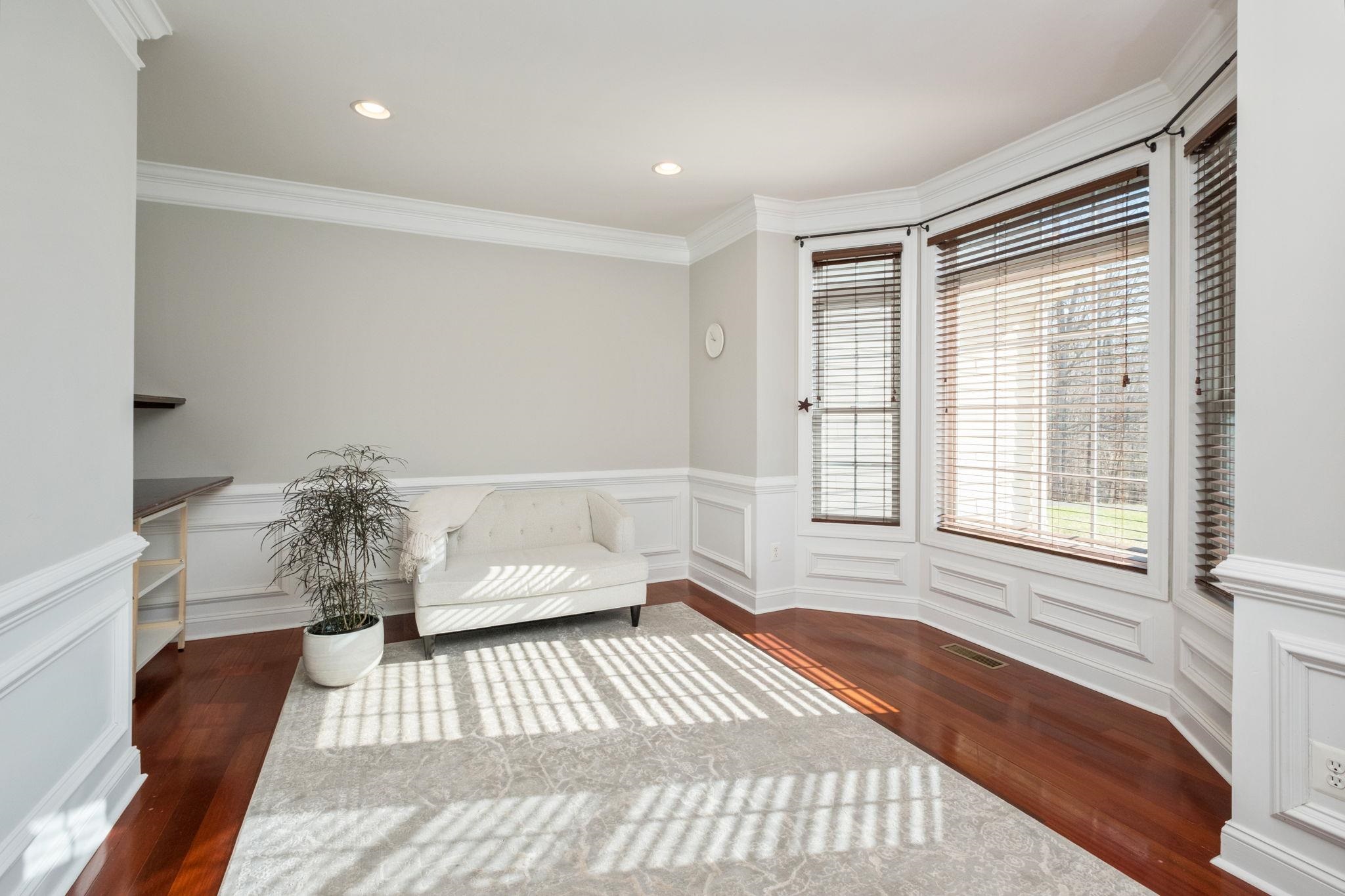 909 Hancock Drive Ruckersville, VA 22968 - Photo 10 of 68 a room with a couch and a large window