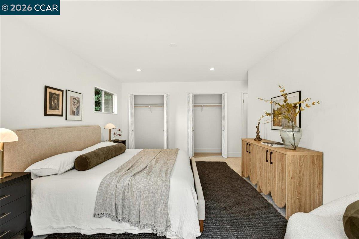 24 Las Vegas Road Orinda, CA 94563 - Photo 23 of 47 a bedroom with a bed and painting on the wall
