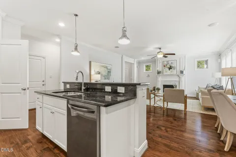 a view of a dining room with furniture and a window