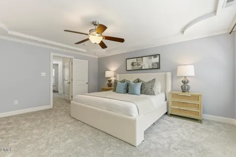 a bathroom with a tub a window and a shower