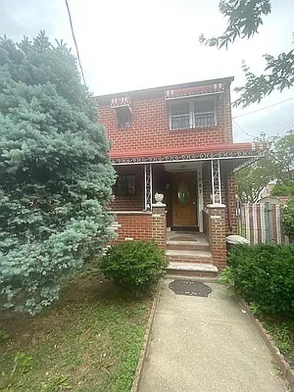 1087 Blake Avenue Brooklyn, NY 11208 - Photo 16 of 16 View of front of property with a porch