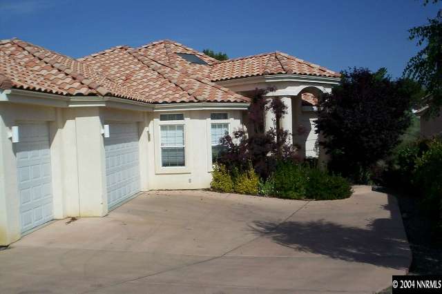 3323 Belford Road Reno, NV 89509 - Photo 1 of 2 front view of a house with a yard