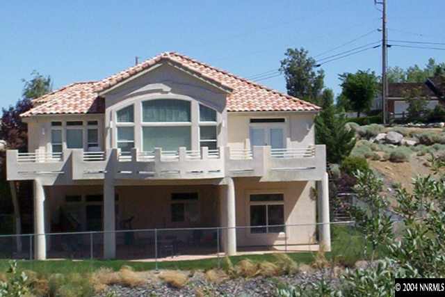 3323 Belford Road Reno, NV 89509 - Photo 2 of 2 a front view of a house with a yard