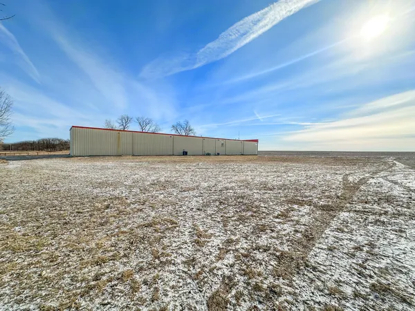 a view of a yard with an ocean