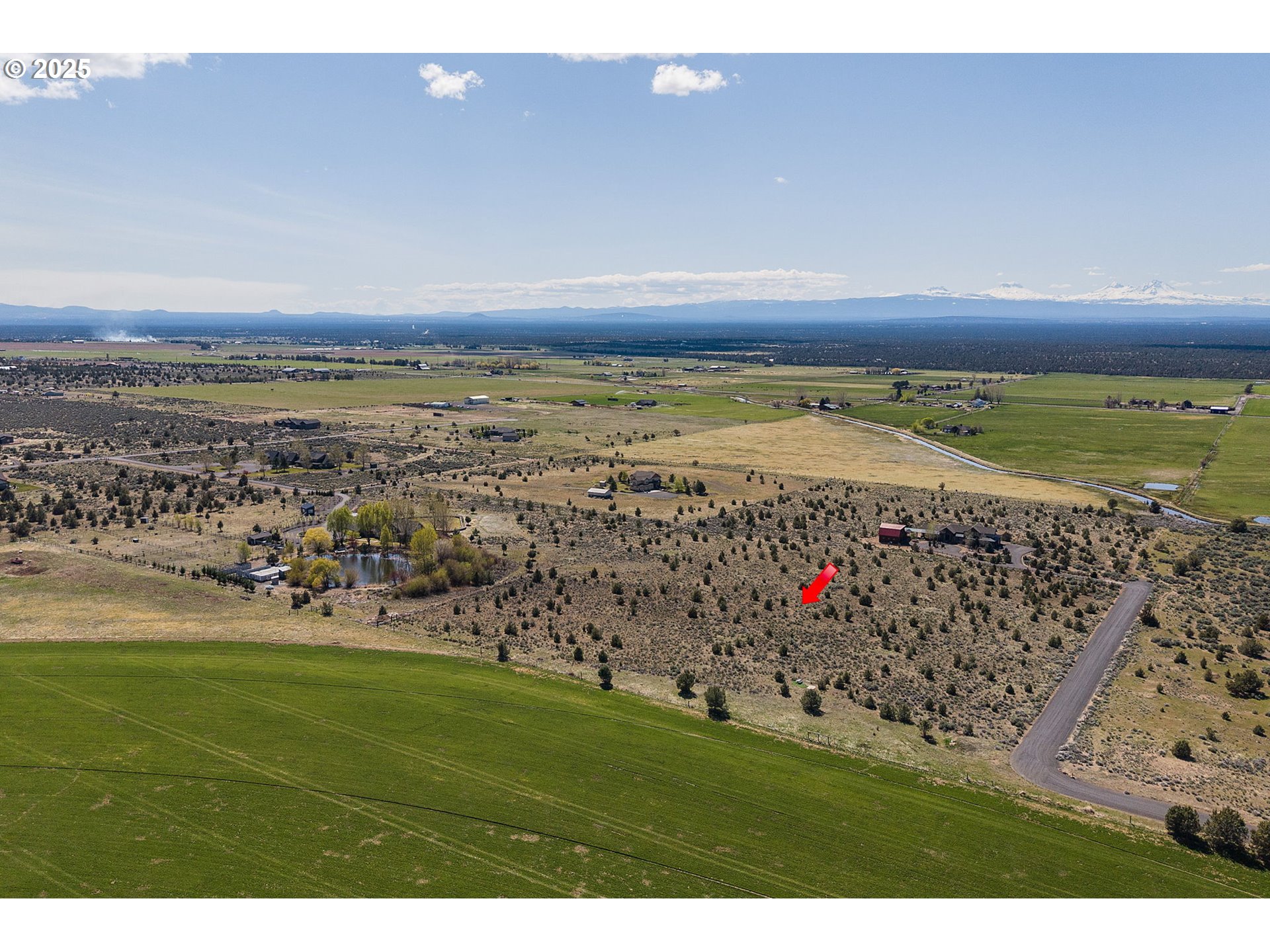 Talarus Trail Powell Butte, OR 97753 - Photo 3 of 23 a view of a field with an ocean