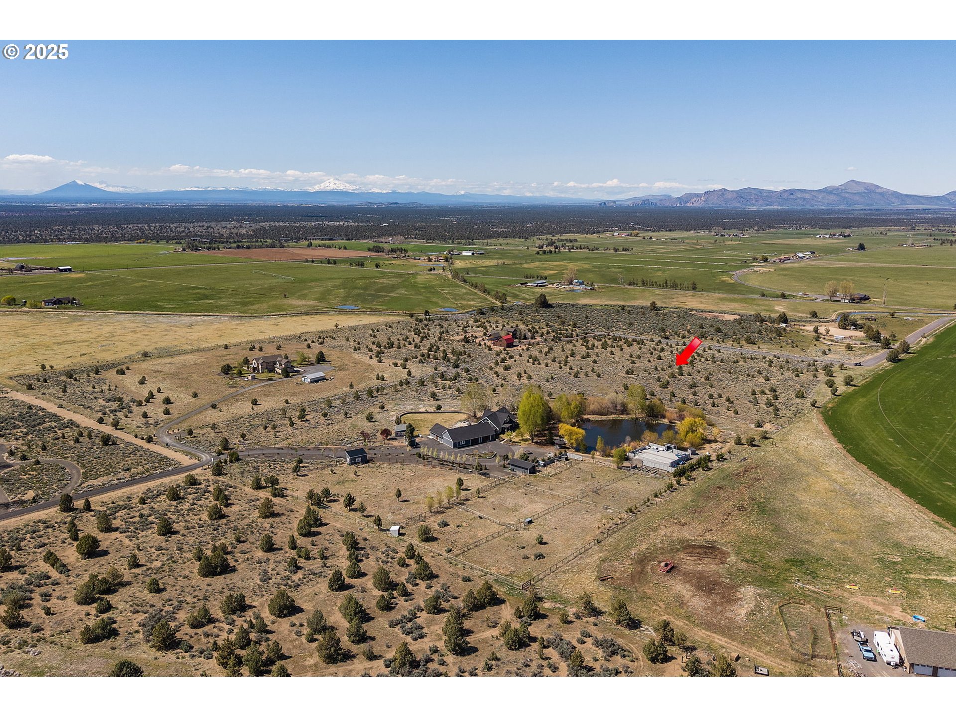 Talarus Trail Powell Butte, OR 97753 - Photo 5 of 23 a view of a lake with a mountain