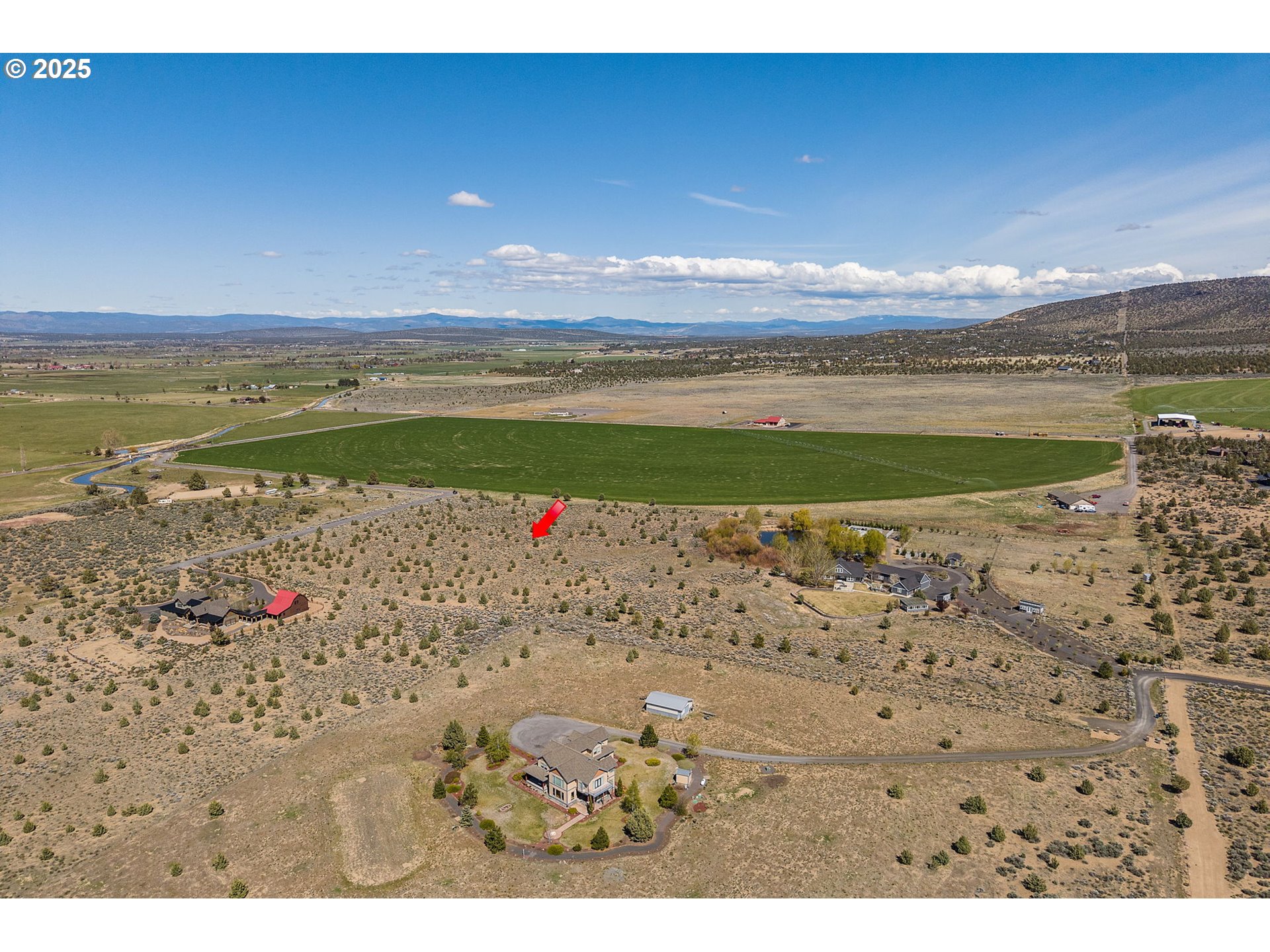 Talarus Trail Powell Butte, OR 97753 - Photo 9 of 23 a view of a lake with a beach