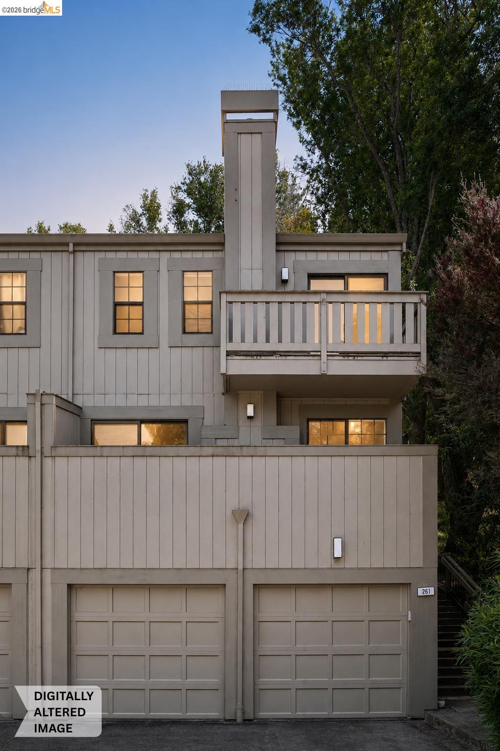 261 Redhawk Road Novato, CA 94949 - Photo 7 of 47 Multi-level exterior with two single-car garages, an upper-level balcony, and multiple windows