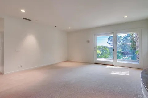 a bathroom with a toilet a sink and shower