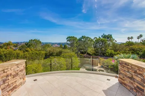 a view of a park with large trees