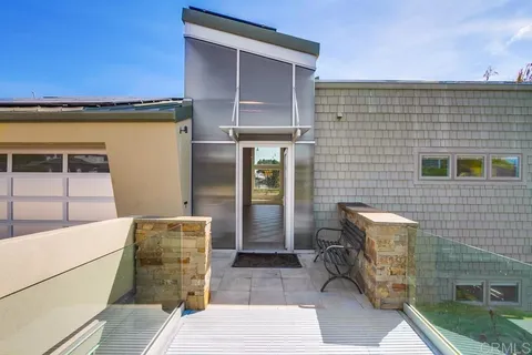 a view of a livingroom with an empty space and a fireplace