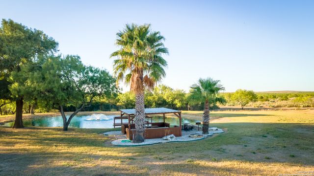 a view of a lake with a big yard